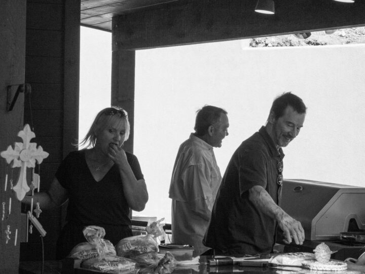 Policy Binding Specialist Diana Parkhill (left), President & CEO Steve B. Stroud (center), and Chief of Staff Brad Smith (right) cooking up a storm at 2023 Stroud National Agency, Inc. Summer Cookout. © 2023 Stroud National Agency, Inc. All rights reserved.