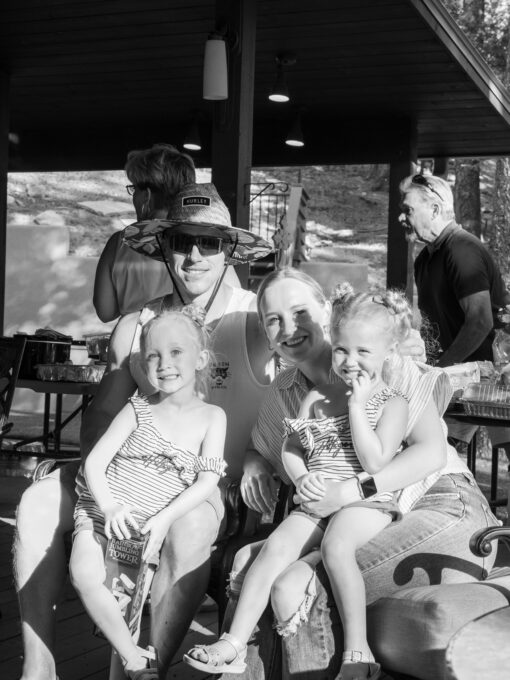 Photo of Underwriter Dawnielle Cunningham (middle right), husband Jacob (middle left) and family soaking up rays at the 2023 Stroud National Agency, Inc. Summer Cookout. © 2023 Stroud National Agency, Inc. All rights reserved.